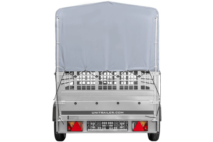 Autotransportanhänger auf Blattfedern 264×125 UNITRAILER GARDEN 264/R KIPP mit Gitterwänden, H-800 Rahmen und grauer Pla