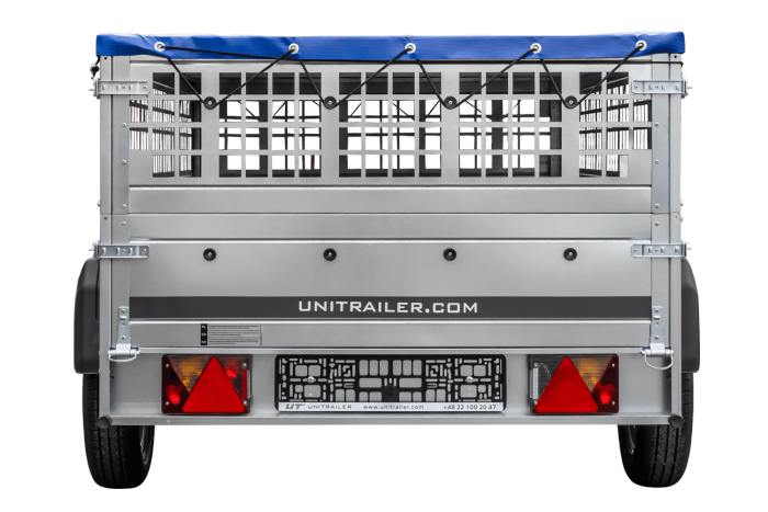 Einachsiger Anhänger auf Blattfedern 264×125 UNITRAILER GARDEN 264/R KIPP mit Gitterseitenwänden, H-0-Rahmen und blauer 